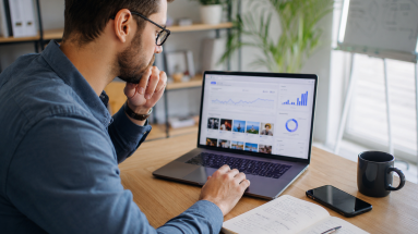 Digital marketer reviewing ad campaign performance before scaling Facebook ads.